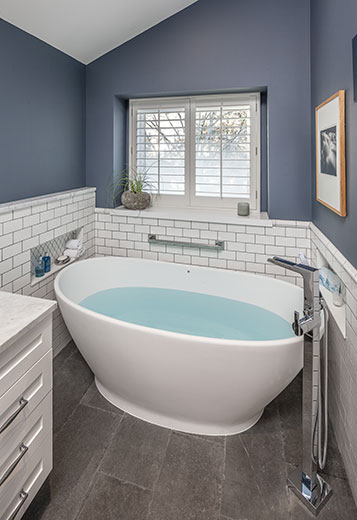 Primary bathroom with large soaker tub and spa-like feel