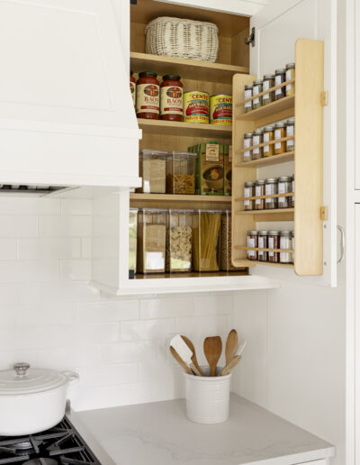 Cabinet with spice and pantry organization in kitchen remodel white white cabinets