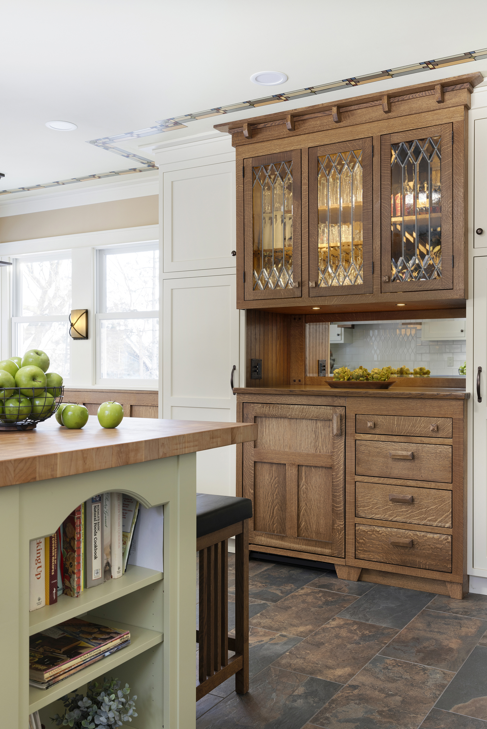 Kitchen remodel with wooden built in hutch with wine refrigerator
