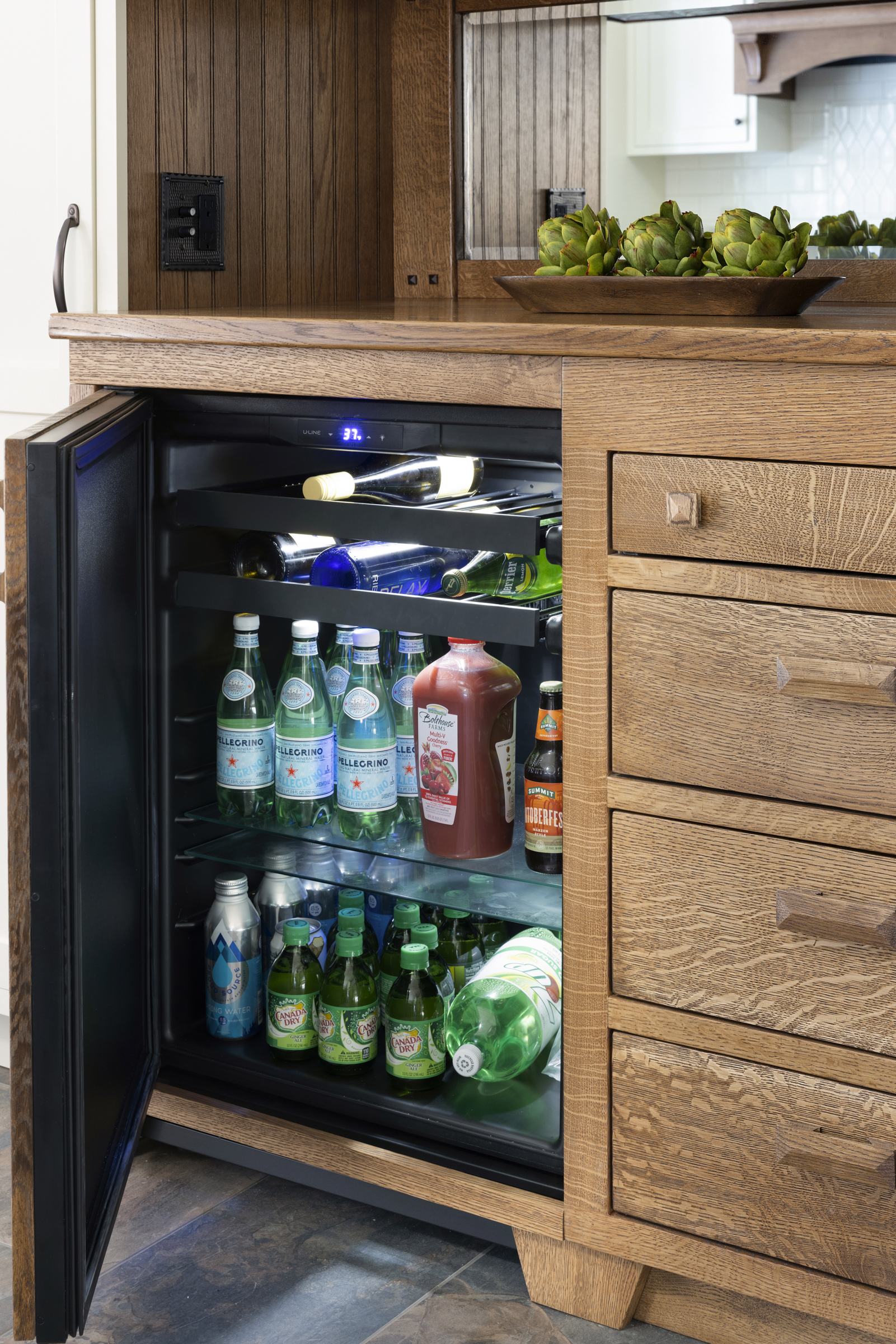 Craftsman kitchen remodel with built in beverage refrigerator