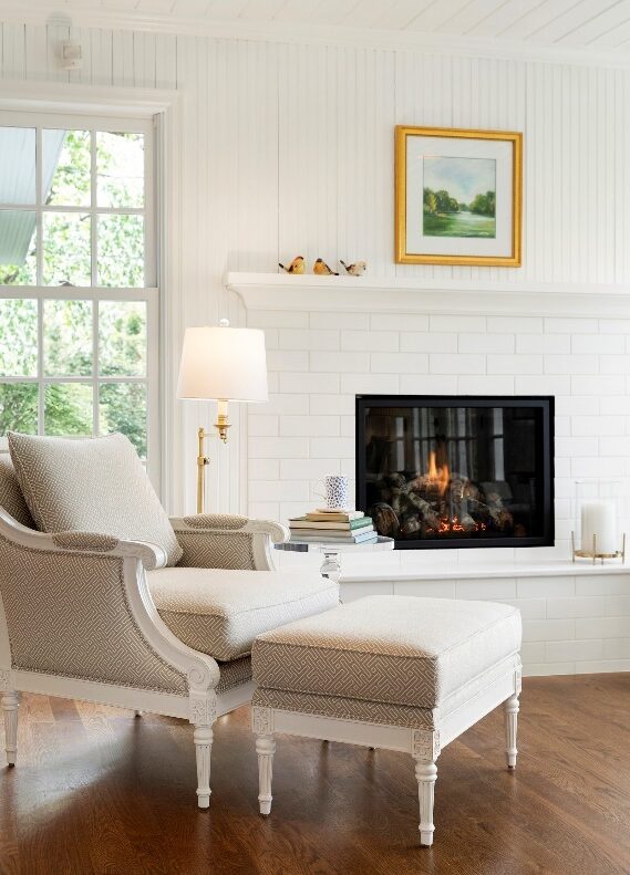 Fireplace remodel with white mantle and brick