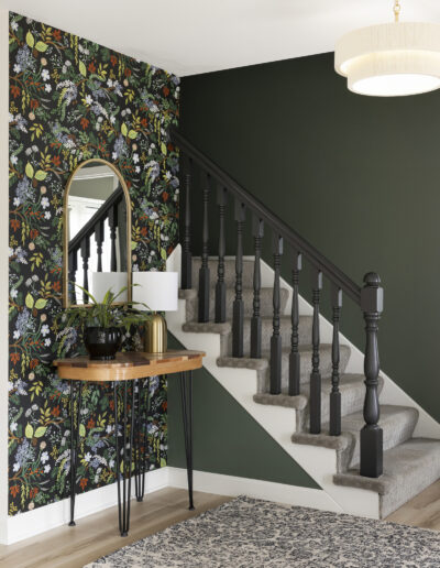 Entryway in Scandifornian home remodel with dark wallpaper