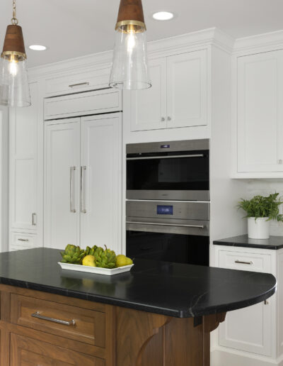 Fall 2024 Remodelers Showcase home - Kitchen remodel with wood lower cabinets and white upper cabinets